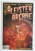 A comic book titled 'Aleister Arcane' issue number 1, featuring illustrated artwork of a creepy smiling face and a skull, photographed flat against a white background.